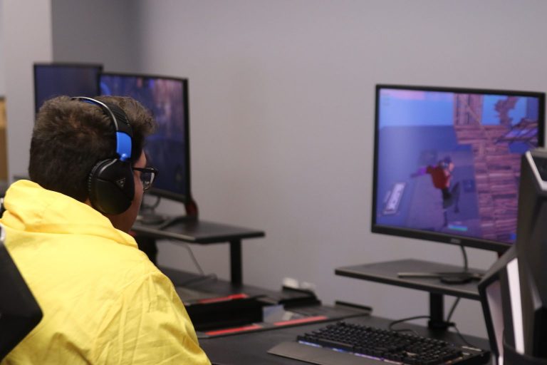 gaming 2 in yellow shirt