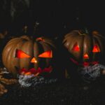 two jack o lantern lamps