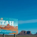 welcome to utah poster under blue daytime sky
