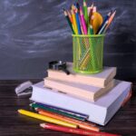 books and pencils on a desk
