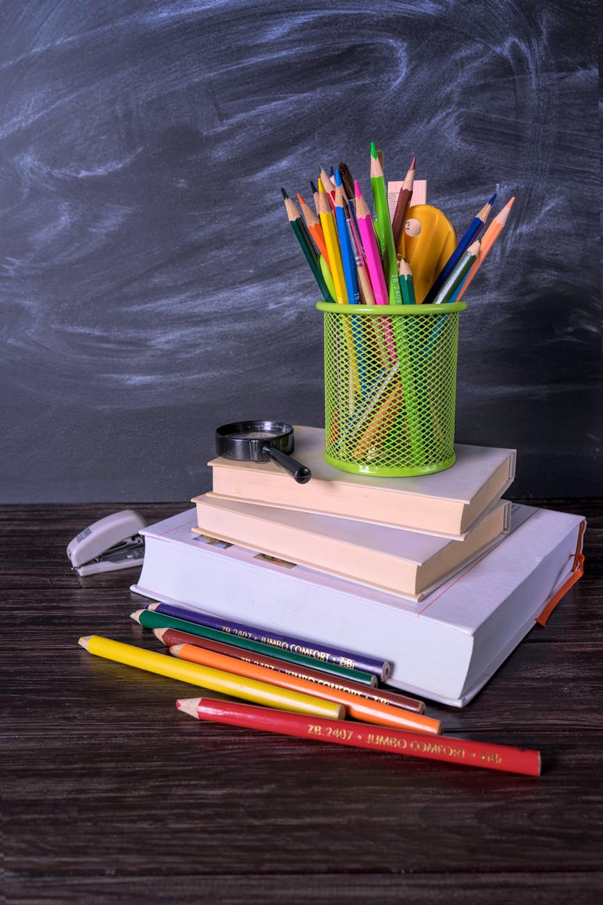 books and pencils on a desk