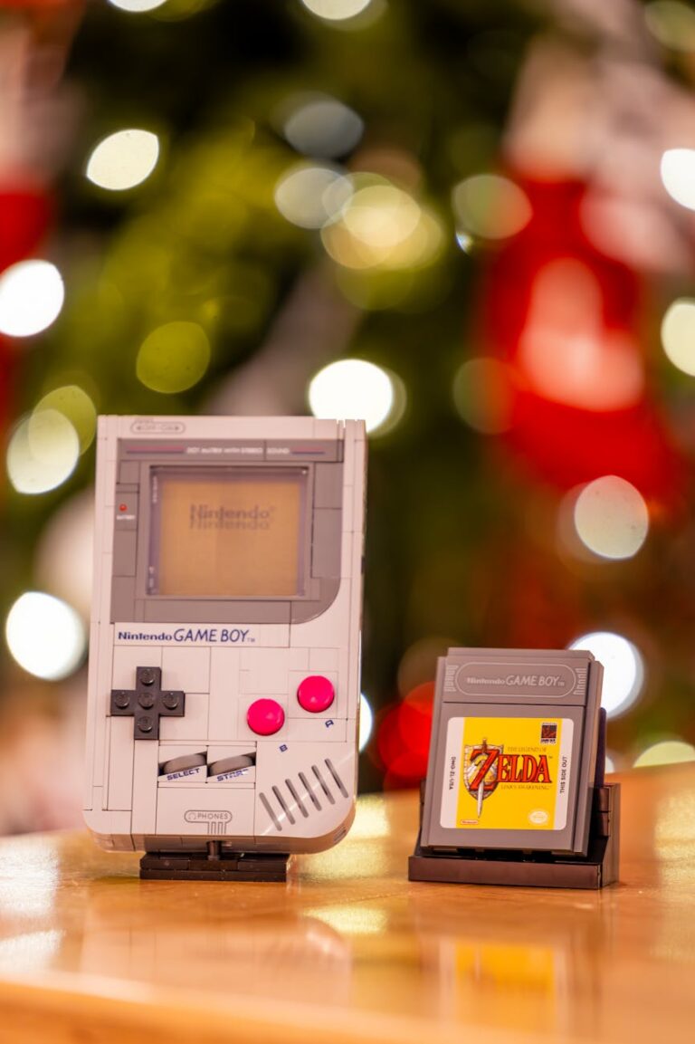 retro game boy and zelda cartridge with festive background