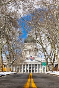 majestic capitol building in snow covered setting